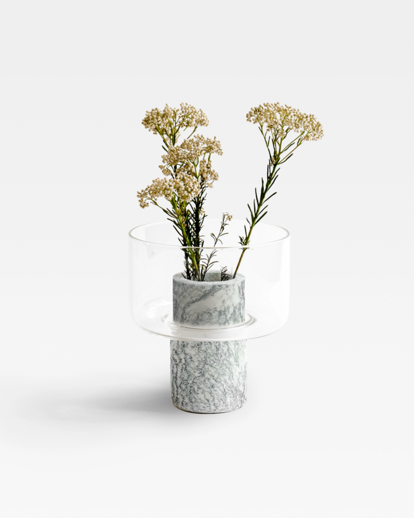 Elegant Abito vase made of handblown glass and green verde cipollino marble