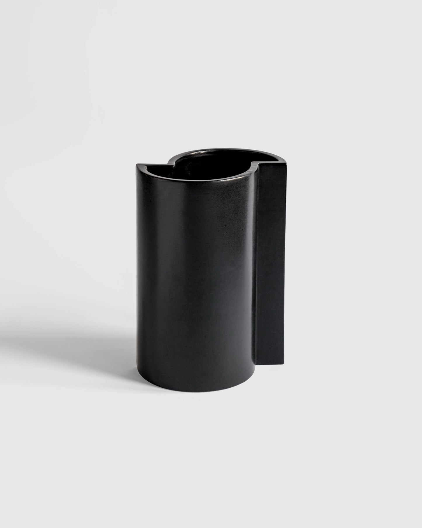 Handcrafted black Bishop Vase showcasing a sleek, contemporary aesthetic.