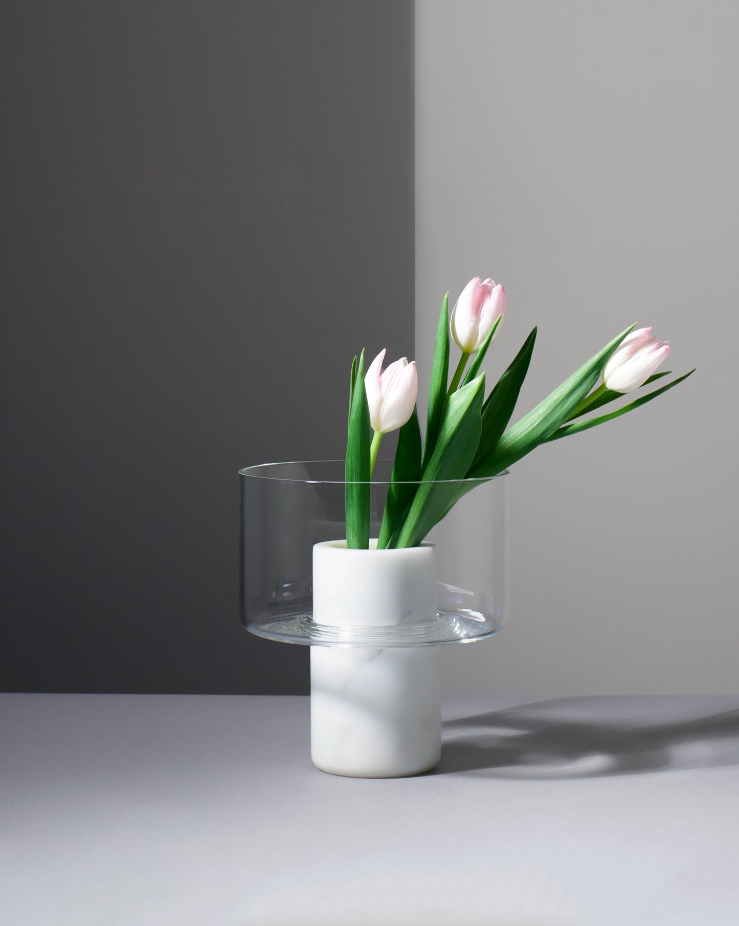White statuario marble and handblown glass Abito vase with pink Tulips