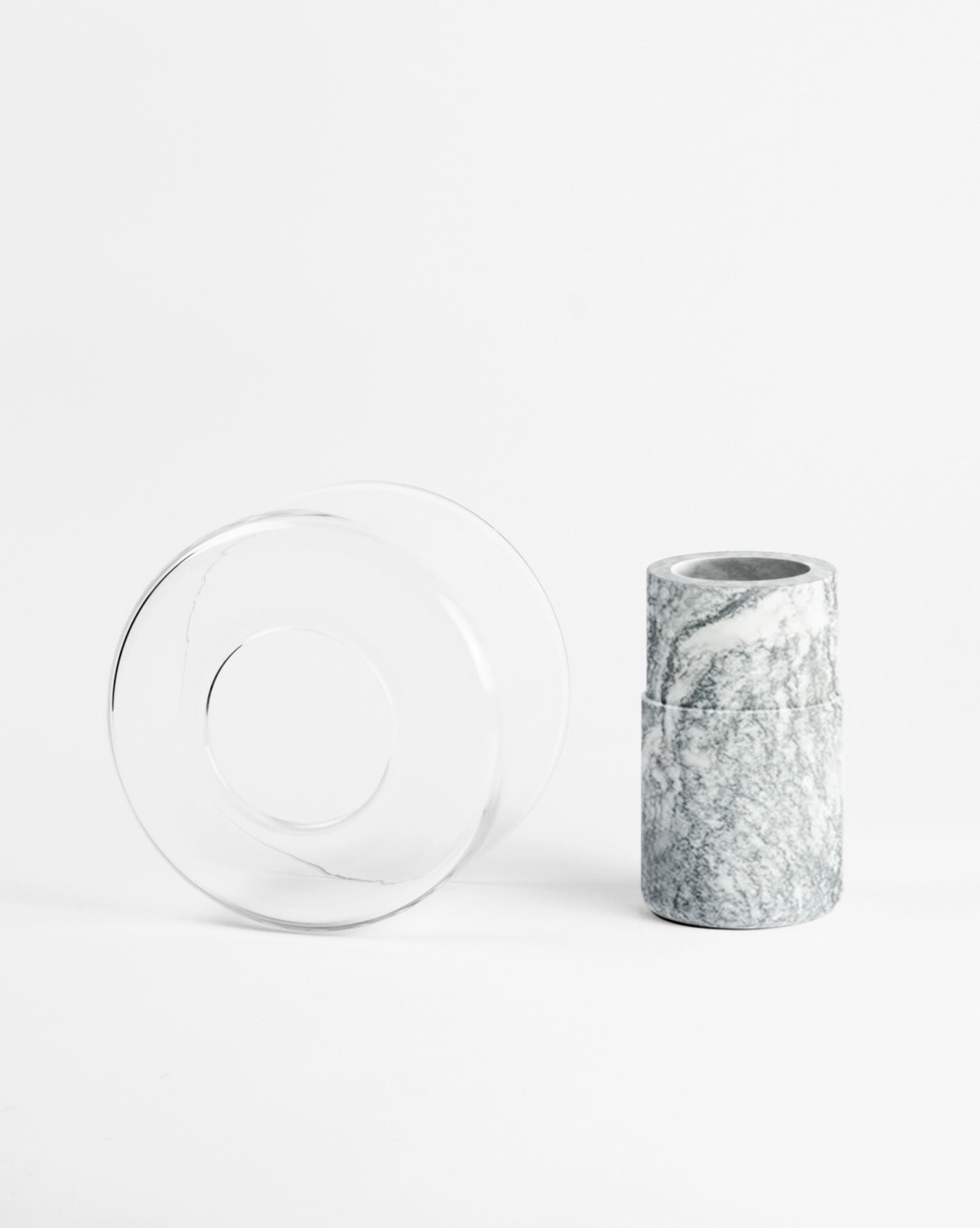Abito vase crafted from handblown glass and green verde cipollino marble parts