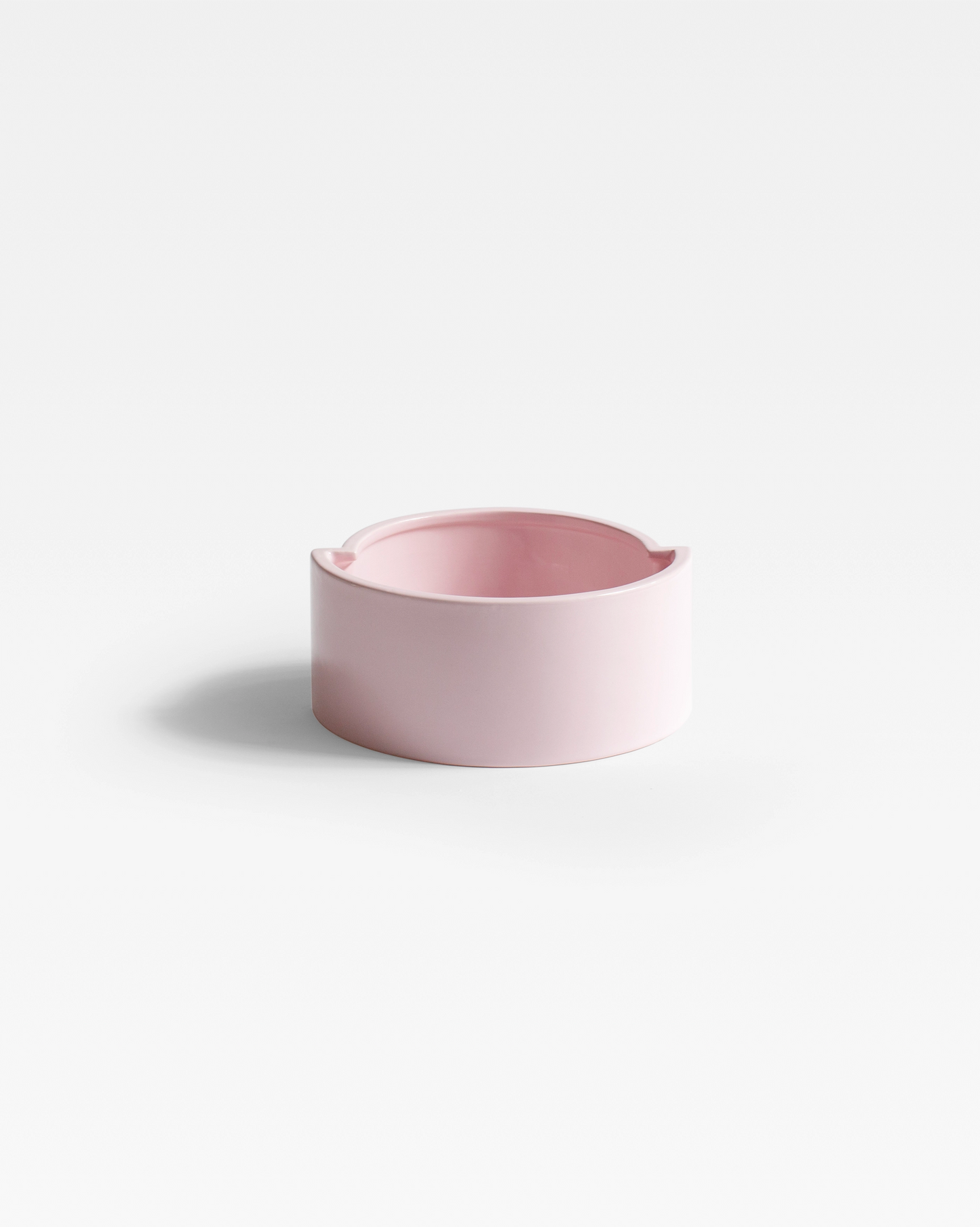 handmade ceramic Pink Pawn Fruit Bowl, emphasizing its elegant shape and appealing pink glaze finish, perfect for minimalist decor lovers.