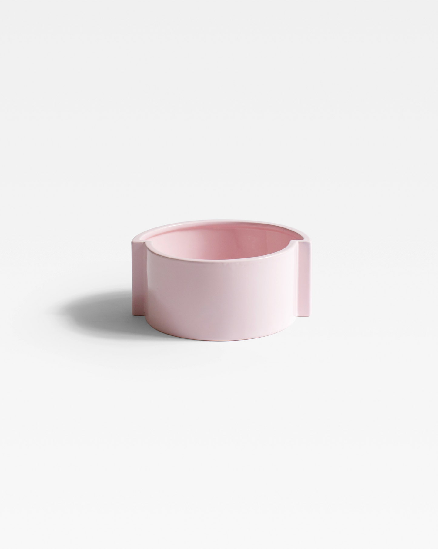 Front view of the Pink Pawn Fruit Bowl, showcasing its minimalistic design ideal for holding fruit or being displayed as decor.