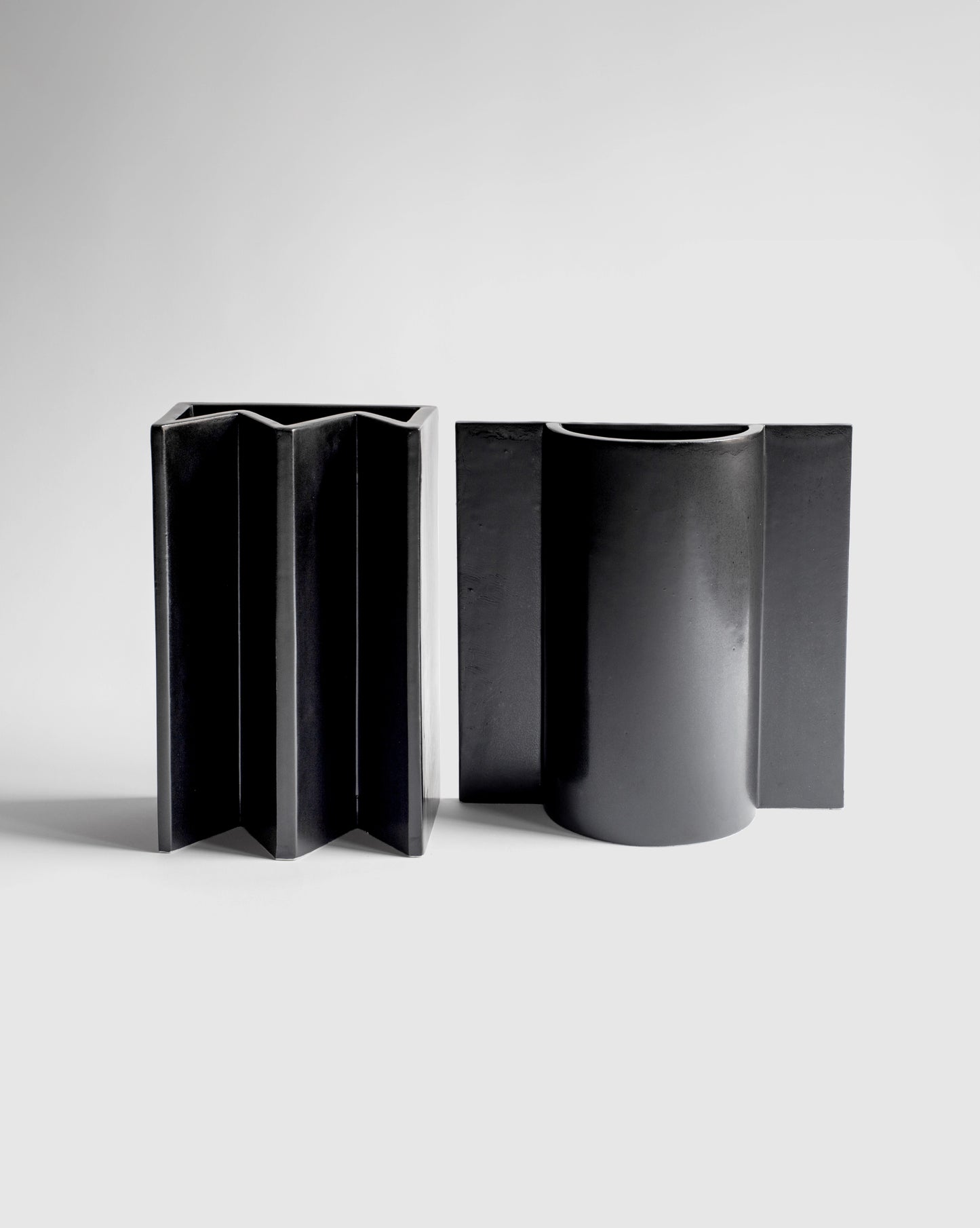 Matte black King and Queen Vases from the Kish o Mat collection.