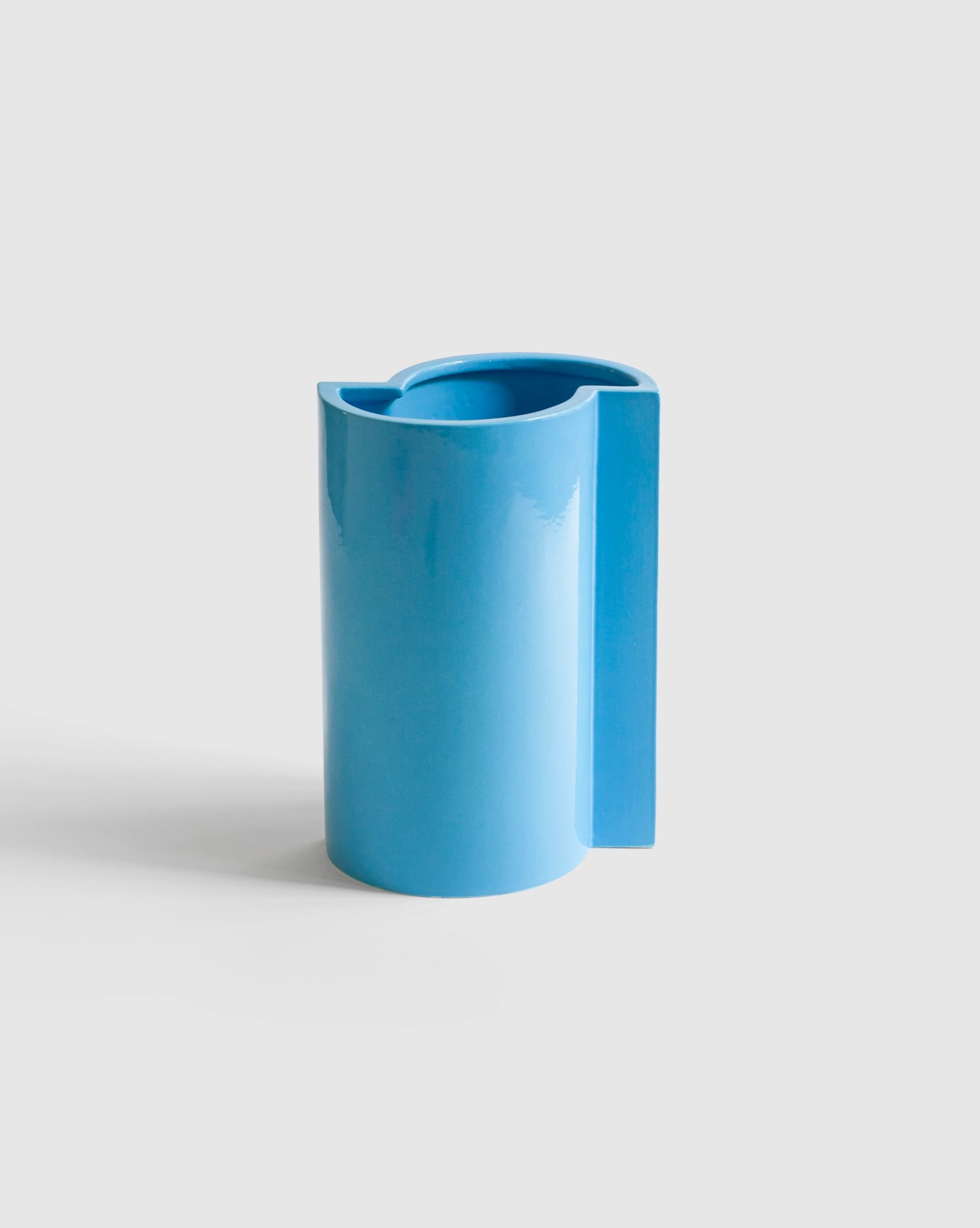 Elegant blue turquoise glazed Bishop Vase designed by artist Sara Khamisi, part of the Kish o Mat collection.