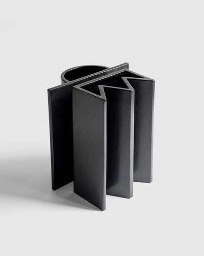 Modern matte black king and Queen Vases back to back designed by artist Sara Khamisi