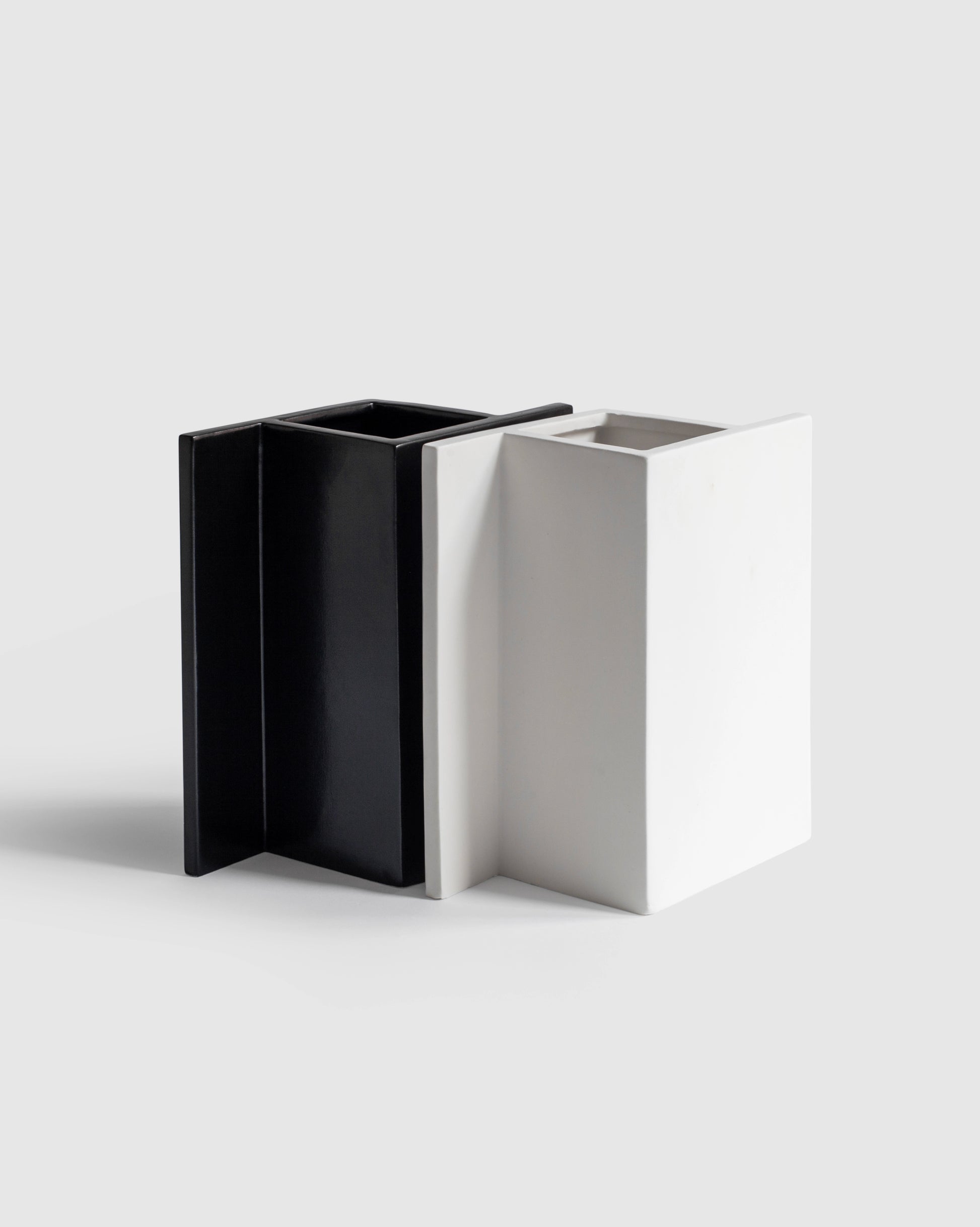 Handcrafted black and white minimalist Rook Vases, showcasing a bold design.