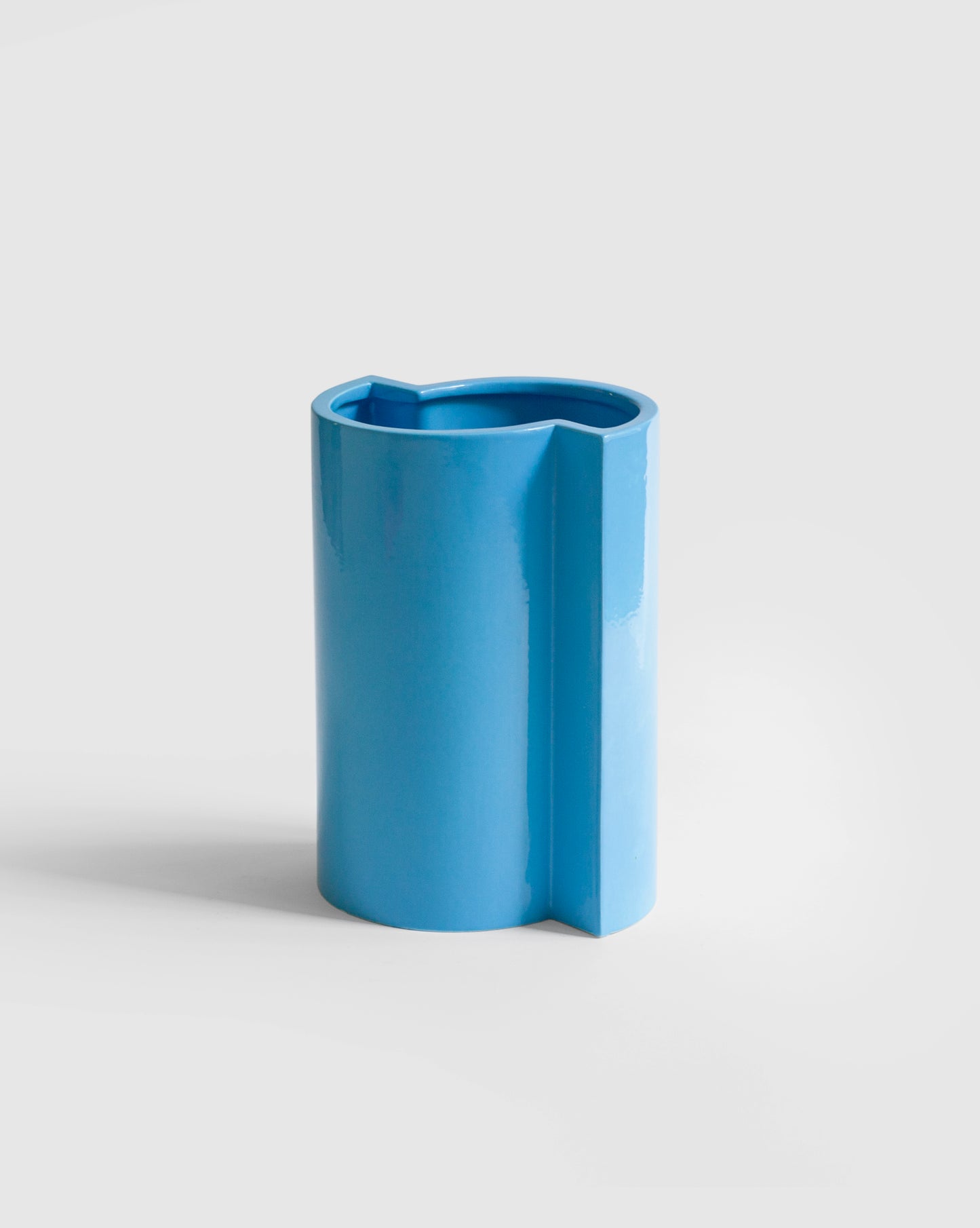 Handcrafted Bishop Vase with a beautiful blue turquoise glaze, showcasing a modern design, shop at Sandro Lopez Milano.