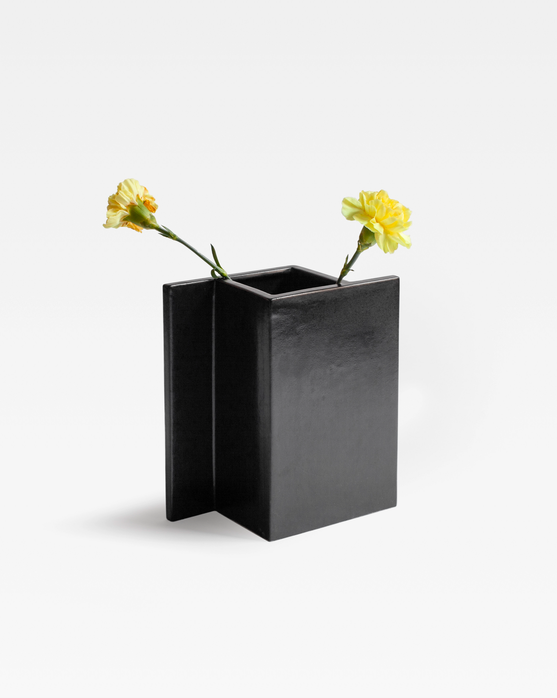 the minimalistic handmade ceramic black "rook" vase, inspired the the game of chess, bold modern home decor