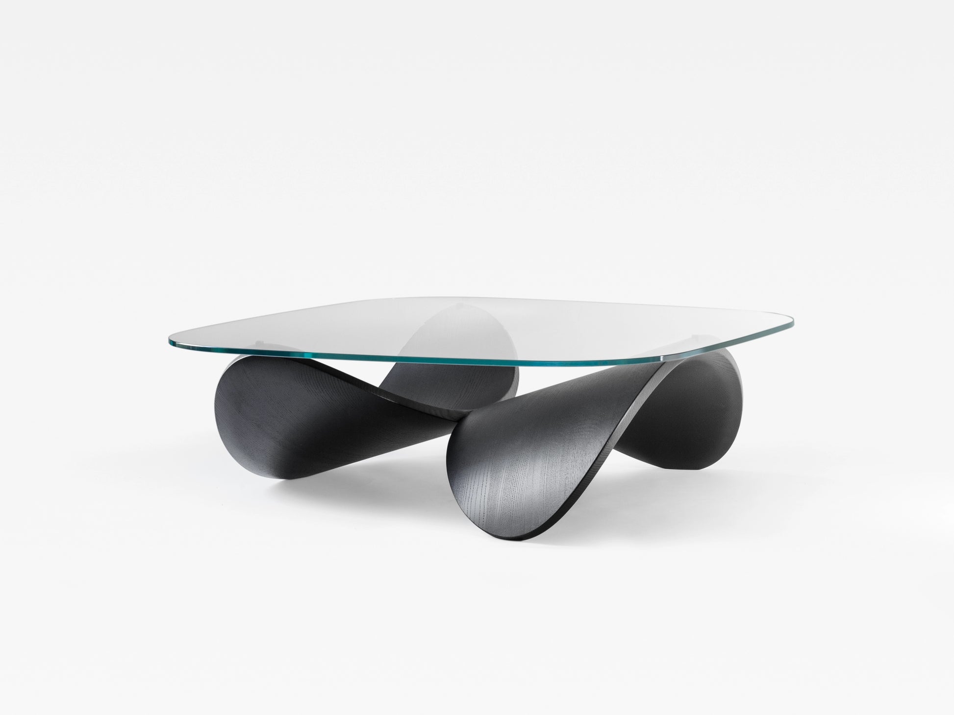 Minimalist sculptural coffee table with no visible assemblies