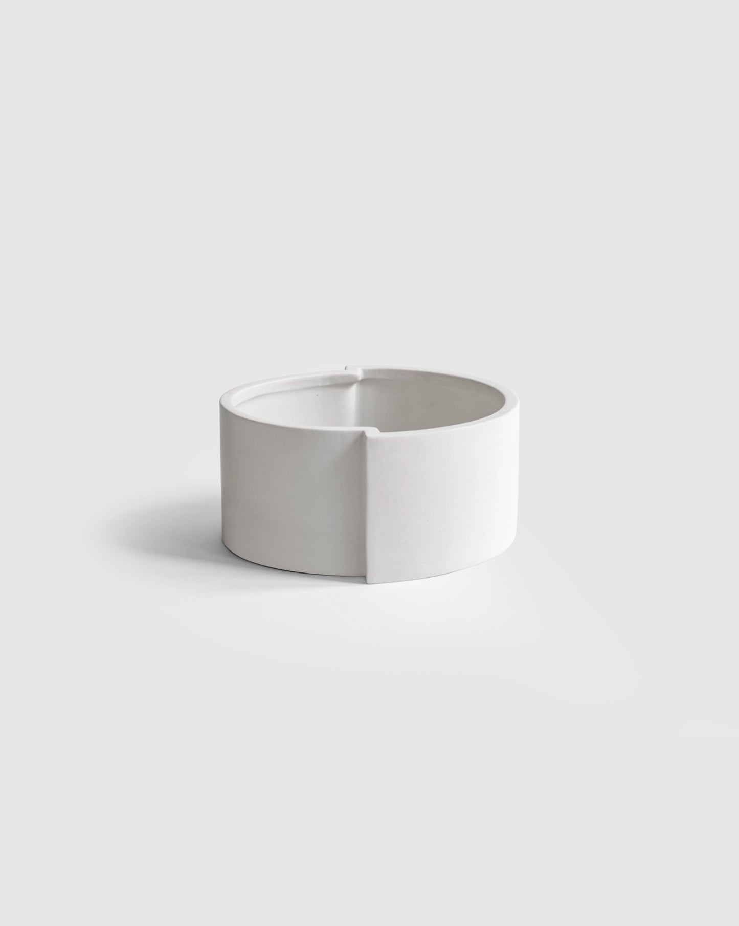 Chess-inspired white ceramic bowl with a smooth, matte finish.