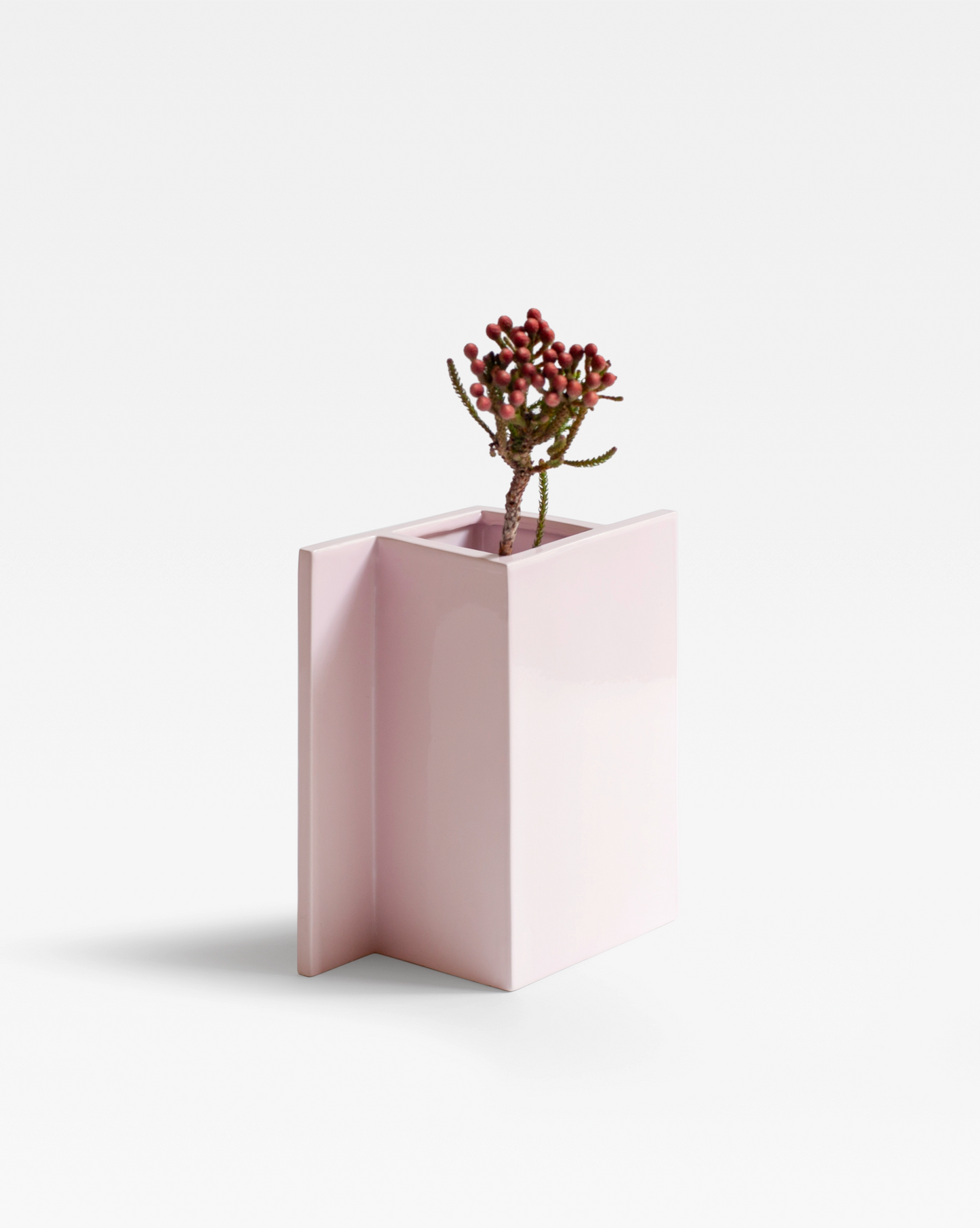 brutalist yet inviting design of the pink ceramic vase, ideal home decor item for design lovers and chess enthusiasts.