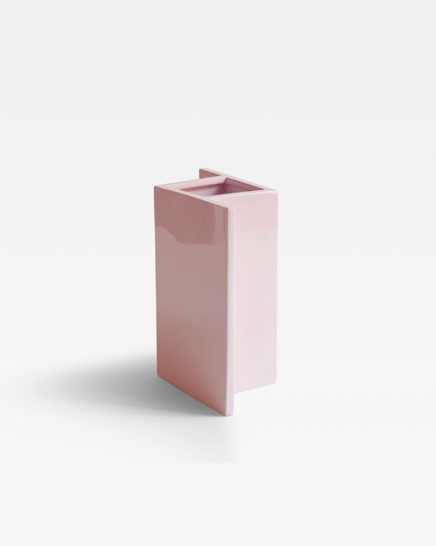 The pink Rook Vase as a centerpiece enhancing the interior accents with its playful design.