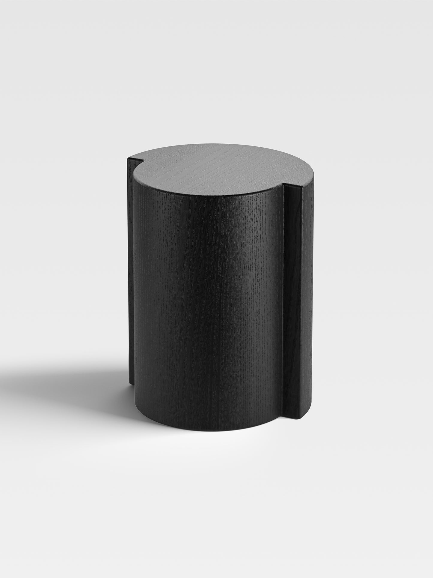 Lei side table in black-stained oak, artistic and tactile, handcrafted in Italy — a sculptural piece of exclusive furniture for refined modern interiors.