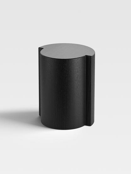 Lei side table in black-stained oak, artistic and tactile, handcrafted in Italy — a sculptural piece of exclusive furniture for refined modern interiors.