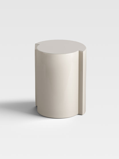 Angled view of Lei in sand finish, showing its soft sculptural contours and artistic craftsmanship from Milan.