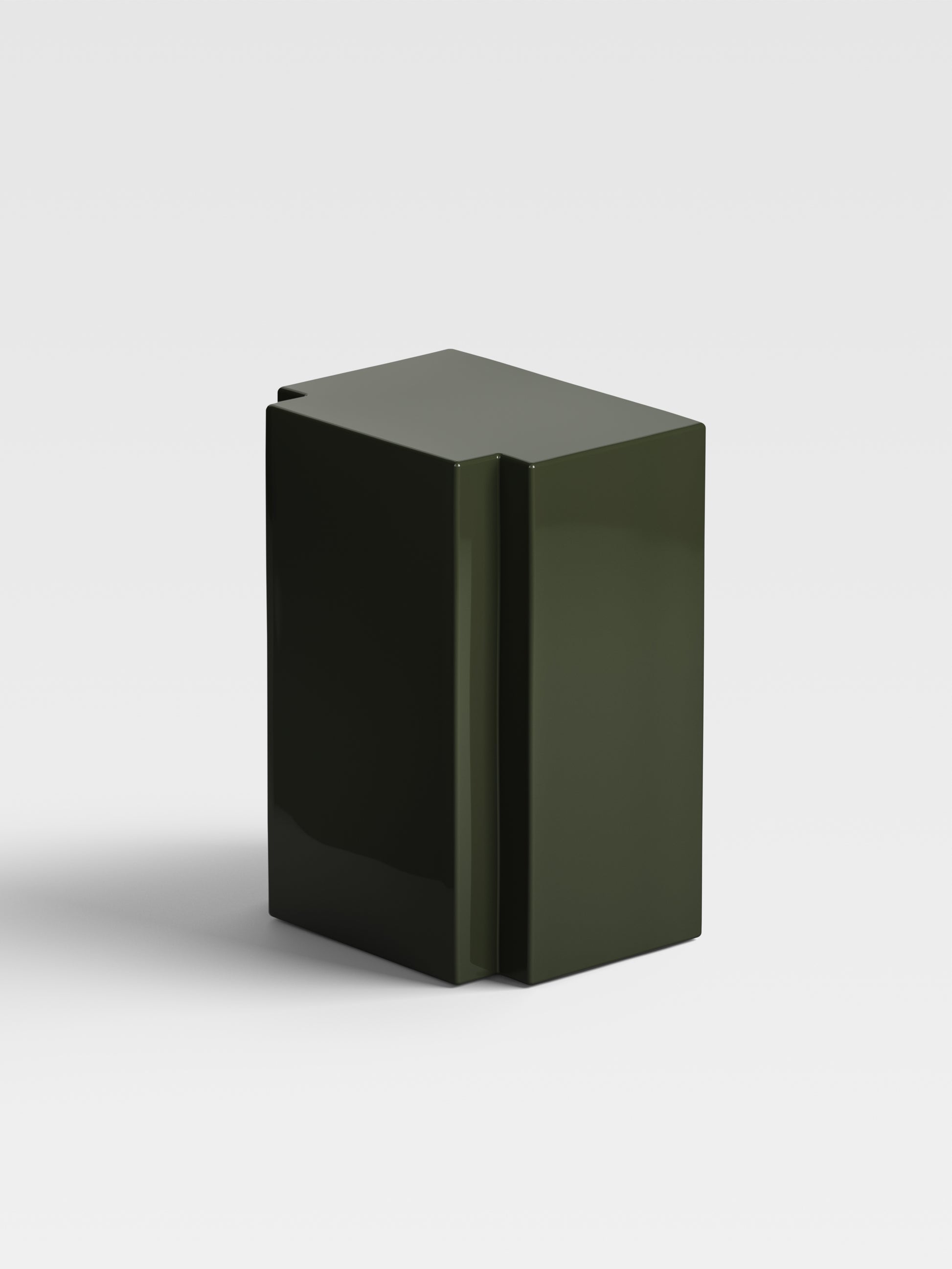 Angled view of Lui olive side table showing minimalist geometry and refined lacquer finish, premium collectible furniture from Milan.